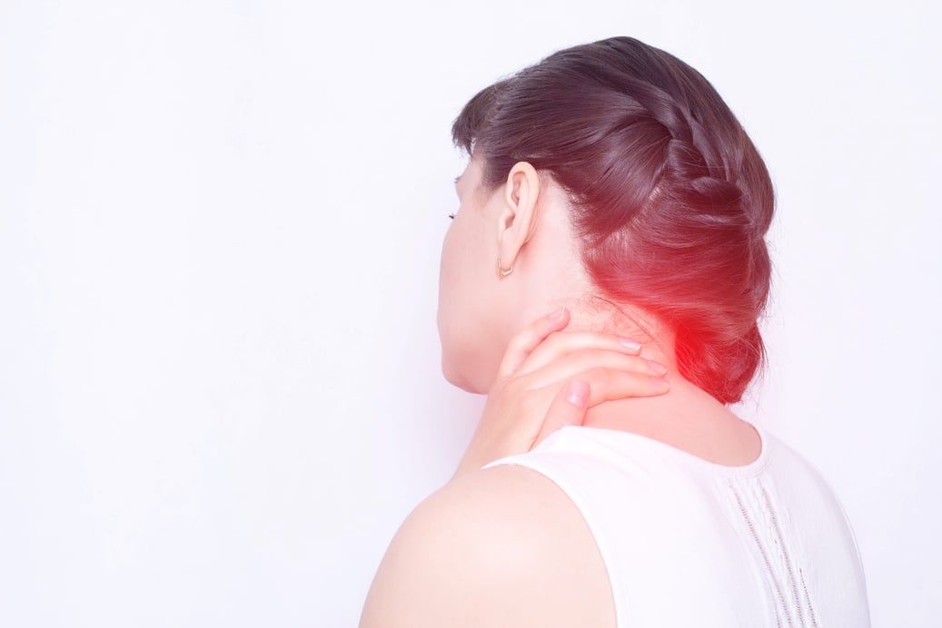 A Young Girl Holds on to a Sore Neck in Which the Protrusion and Fibromyalgia of the Muscles, Medical, Copy Space, Vertebral Instability